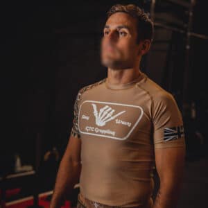 Man in Tribal Tan Rashguard